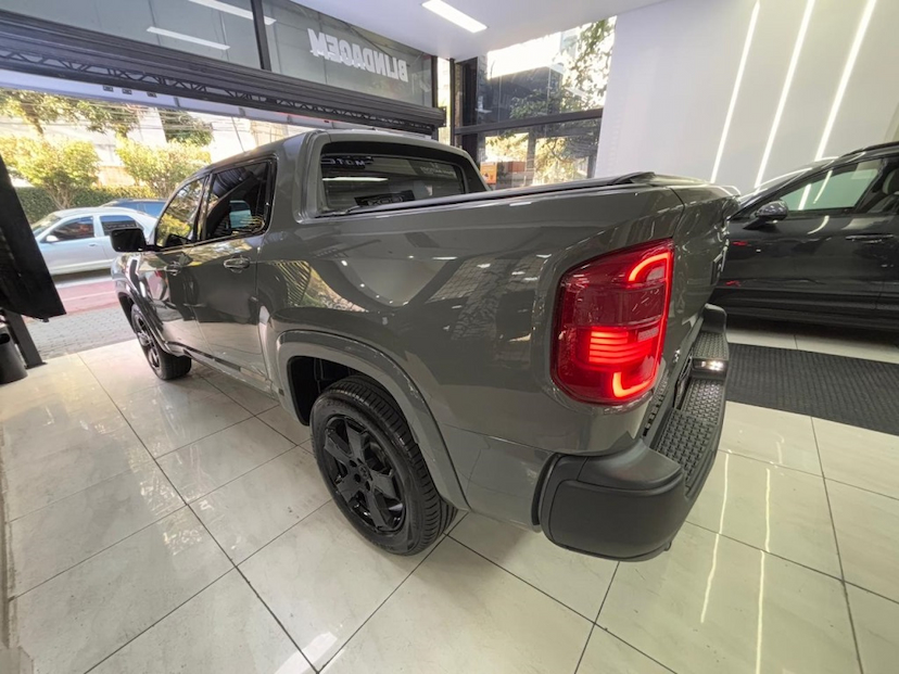 Foto do veículo RAM RAMPAGE 2.0 HURRICANE 4 TURBO GASOLINA LARAMIE 4X4 AUTOMÁTICO 2024 29.007 KM 180.777,00
