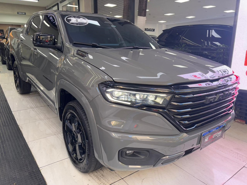 Foto do veículo RAM RAMPAGE 2.0 HURRICANE 4 TURBO GASOLINA LARAMIE 4X4 AUTOMÁTICO 2024 29.007 KM 180.777,00
