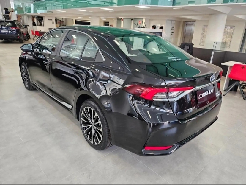 Foto do veículo TOYOTA COROLLA 1.8 VVT-I HYBRID FLEX ALTIS PREMIUM CVT 2026 0 KM 195.490,00